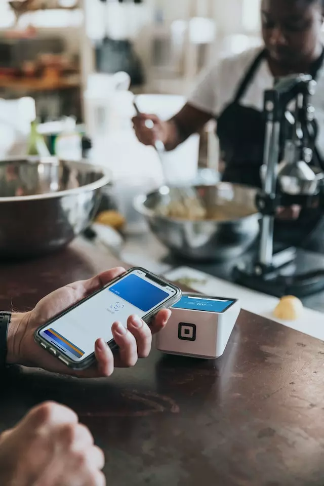 Person who is using a credit card