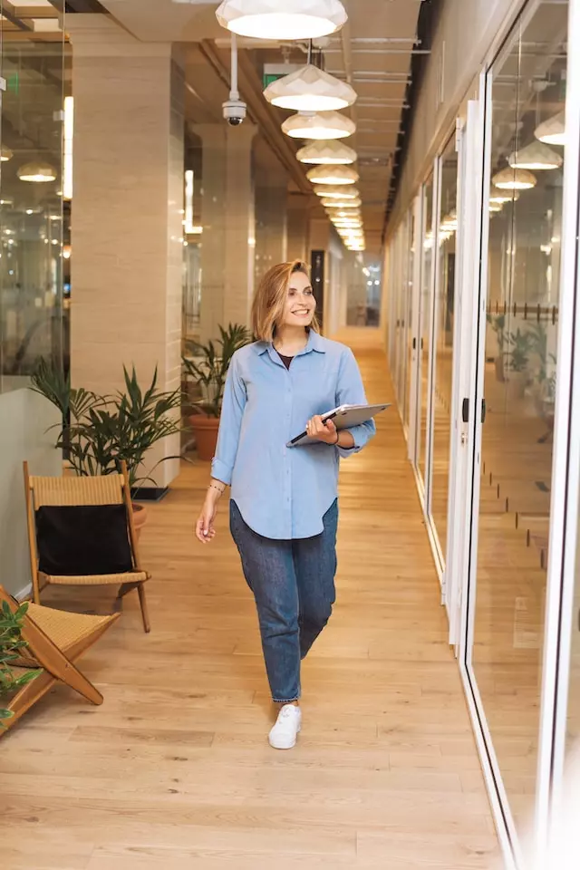Woman walking in an office