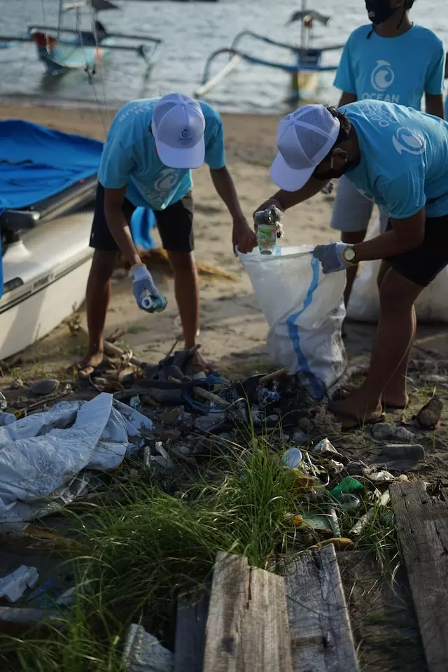 OCG cleanup crew cleaning the beach (Bali indonesia)